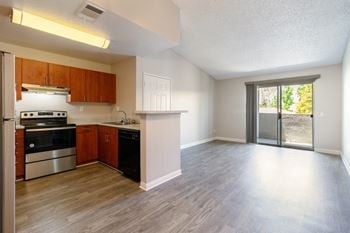 Cherry wood and white style cabinets are available in select units.